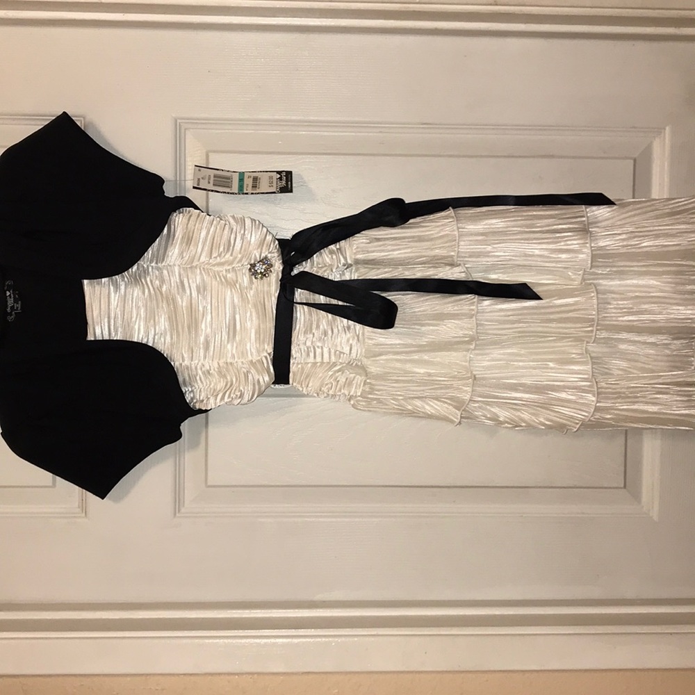 White and black child’s dress